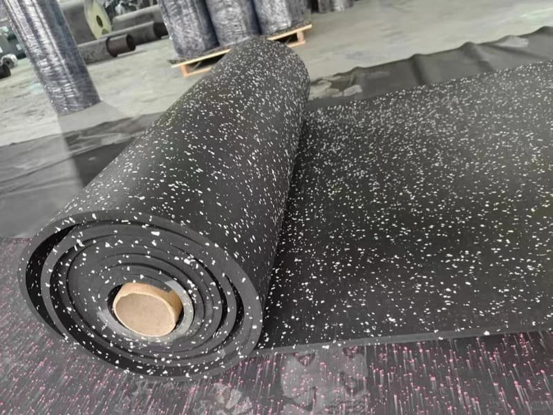 Infrared thermometer checking rubber and subfloor temperature